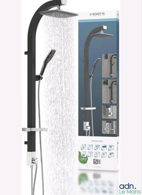 a close up of a shower head with thermostaer and shower head