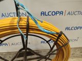 a yellow hose that is connected to a black wire