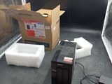 a box and a box of tissues on the floor in front of a box