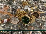 many watches on display in a glass case