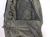 the back of a backpack with a mesh bag attached to it