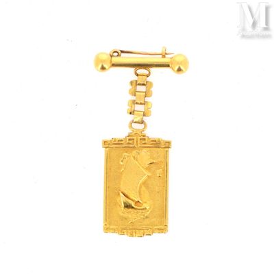 an image of a gold plated keychain with a dog on it