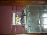 a binder that has a key in it on a table