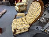 a chair and a chair that are sitting in a room