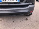 a picture of a car with a license plate on the front of it