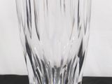 a glass vase that is sitting on a table