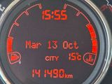 a close up of a speedometer on a car ' s dashboard