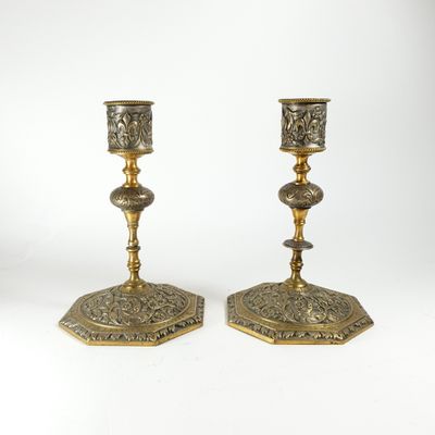 pair of antique brass candlesticks with floral design