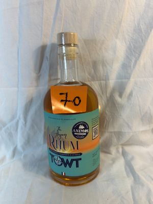 a bottle of rum that is sitting on a table