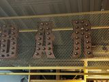 a large metal sign that is above a shelf