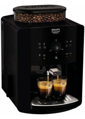 gros plan d'une machine à café avec deux tasses de café