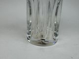 a glass vase that is sitting on a table