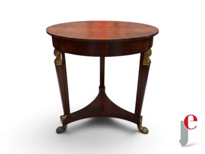 an image of a round table with a wooden top