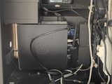 a picture of the inside of an airplane with a computer and a monitor