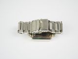 an image of a watch on a white surface with a white background