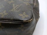 a close up of a louis vuitton bag on a table
