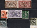 a close up of a group of stamps on a black surface