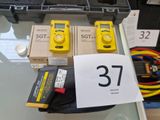 three yellow and black electronic devices on display