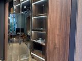 a large glass door in the middle of a room