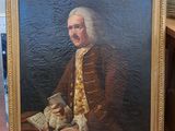 tableau représentant un homme vêtu d'un manteau marron, tenant un livre et un ours en peluche