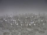 a lot of empty wine glasses sitting on a table