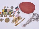 a lot of items that are laying out on the table