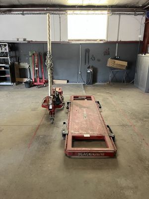 a red fire hydrant sitting in the middle of a room