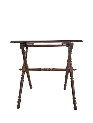 an old wooden table with a glass top on a white background
