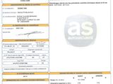 un gros plan d'un document sur lequel figure la photo d'une voiture