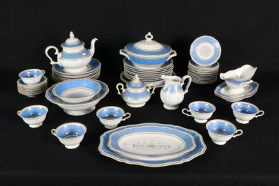 a picture of a blue and white dinner set on a black table