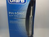 Brosse à dents électrique Oral-B Dual Sonic dans son emballage