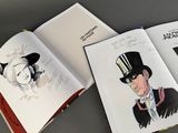 a book with a drawing of a man in a top hat and a drawing of a woman in a top hat
