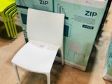a lot of boxes and chairs that are sitting on the floor