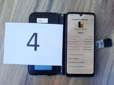 a picture of a phone that is open on a table