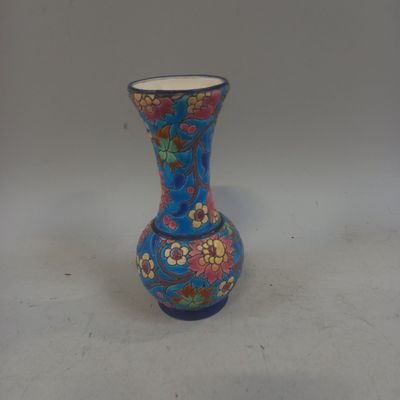 LONGWY. VASE balustre en faïence émaillée à décor floral.