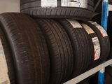 a lot of tires on the shelves in the store