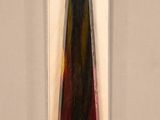 a picture of a tie hanging on a wall