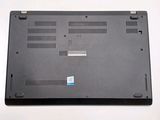 a black laptop with a blue sticker on it