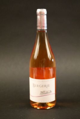 a bottle of wine that is sitting on a table