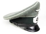 a black hat with a white flower on it