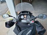 a motorcycle that is parked outside of a building