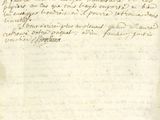 un vieux document écrit posé sur une table