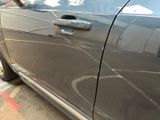 a car that is parked on the side of the street
