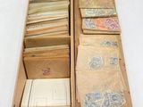 a wooden box filled with lots of different types of papers