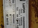 a close up of a sign on the side of a tractor