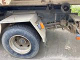an image of a truck that is parked in a lot