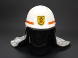 white fireman helmet with orange stripe and helmet visor on a mannequin mannequin mannequin mannequin mannequin mannequin mann