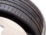 a tire that has been wrapped in plastic to protect it from the sun