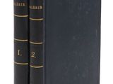 un livre noir orné d'une bande dorée sur la couverture et un livre noir orné d'une bande dorée au dos