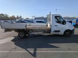 a white truck that is parked in a parking lot